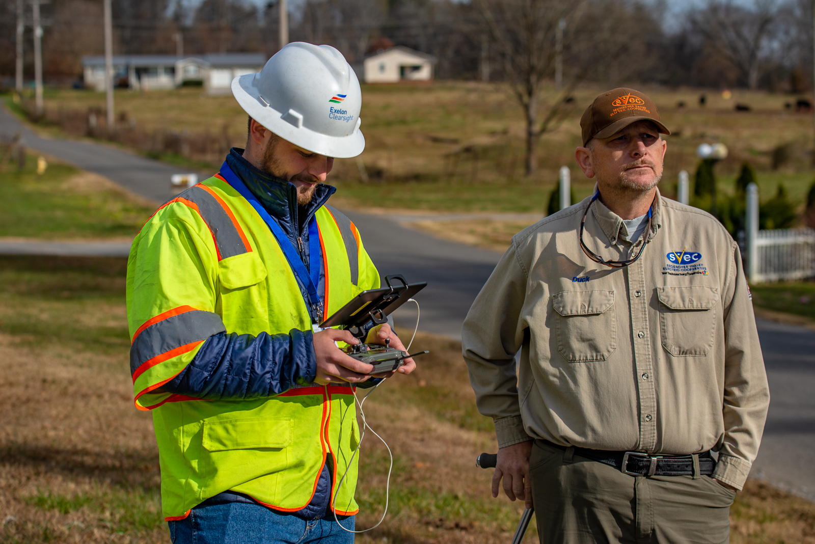 Safety Coordinator, Donnie Cooper and drone pilot flying drones for pole coverage.